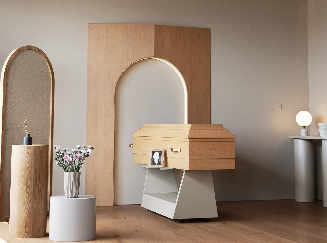 L'Universel with a wooden coffin in a pared-back space of remembrance